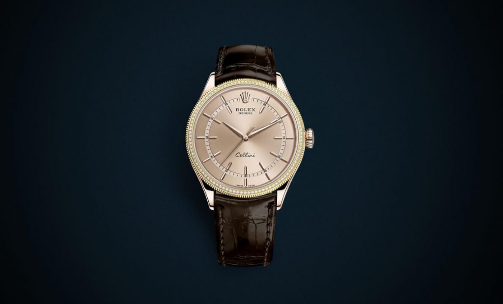 The 18ct everose gold fake watch has a black strap.